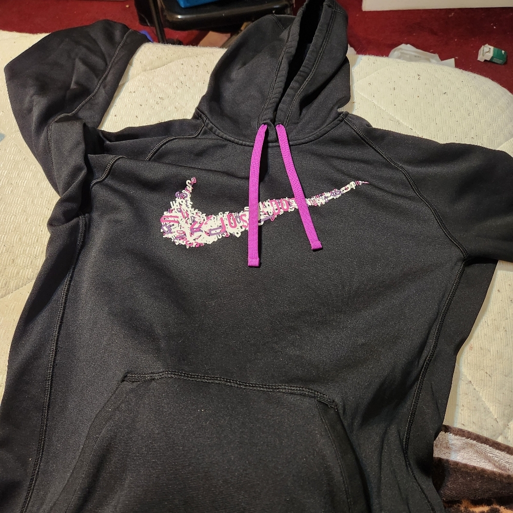 6. Nike medium hoodie with purple strings black I  color size medium
